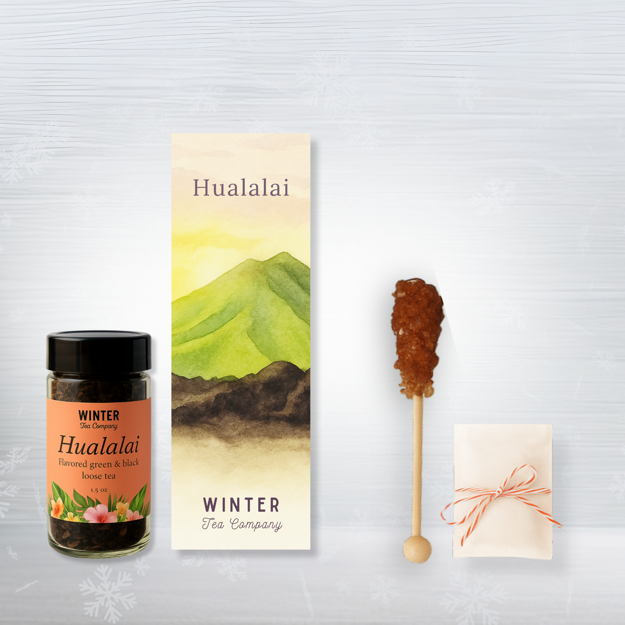 Tea packaging with a jar, book, and decorative items on a light gray background